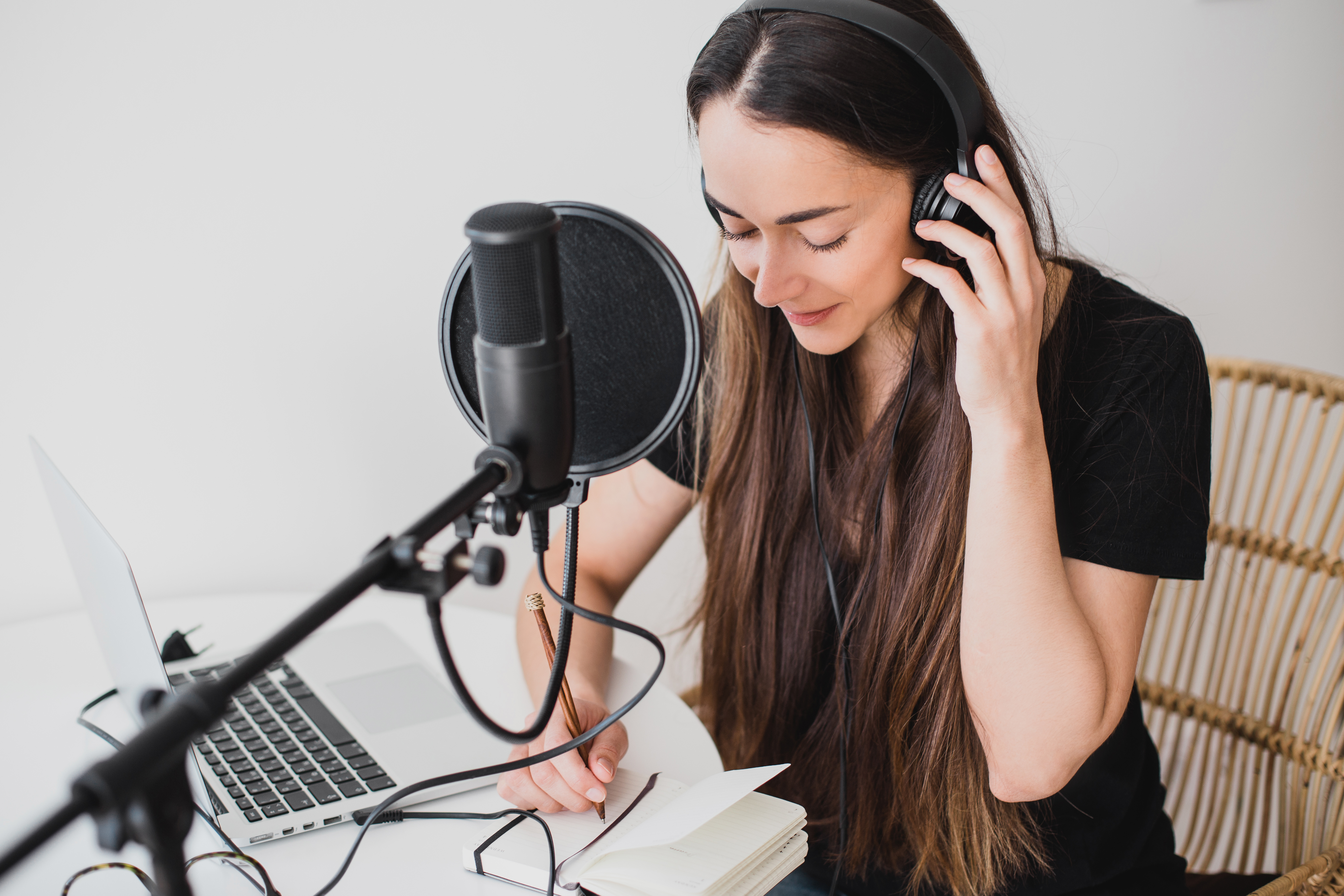 woman recording a podcast